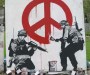 banksy-soldiers-painting-peace-sign